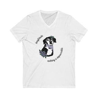 Signature Tattoo Flowers Unisex Jersey Short Sleeve V-Neck Tee in White. Shown is front of shirt with the Signature Tattoo Flowers design featuring a dog with flowers around it and the phrase "Beagletude" and "Nothing is Impawssible". Back of shirt features the Benefit Beagle Logo.