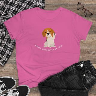 Easily Distracted Women's Midweight Cotton Tee in Azalea. Shown is front design featuring a dog waving with the saying "Easily Distracted by Dogs" below it. The back of shirt has the classic Benefit Beagle Logo.