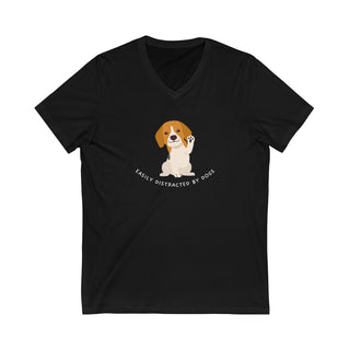 Easily Distracted Unisex Jersey Short Sleeve V-Neck Tee in Black. Shown is front design featuring a dog waving with the saying "Easily Distracted by Dogs" below it. The back of shirt has the classic Benefit Beagle Logo.