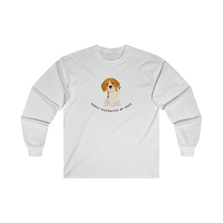 Easily Distracted Ultra Cotton Long Sleeve Tee in White. Shown is front design featuring a dog waving with the saying "Easily Distracted by Dogs" below it. The back of shirt has the classic Benefit Beagle Logo.