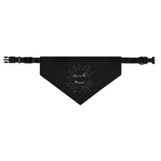 Live in the Moment Dog Collar Bandana in Black. The Live in the Moment design features the the phrase "Live in the Moment" surrounded by a circle of shooting stars. Comes with adjustable black collar.