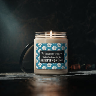 Brightest Stars scented soy candle 9oz. The Brightest Star design features an all-over print of pawprints and a nautical star and the phrase "The brightest stars are those who shine for the benefit of others"  Available in White Sage + Lavender, Clean Cotton, or Sea Salt + Orchid