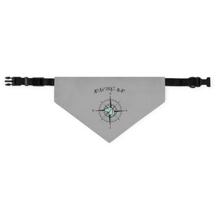 Grey dog collar bandana with the Adventures Await design features a nautical compass with the profile of a dog in the center. Comes with adjustable black collar. 