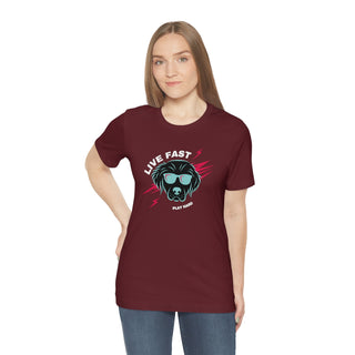 Play Hard Unisex Jersey Short Sleeve Tee Shirt in Maroon. The design features a cool dog with sunglasses and lightening bolts arond it. The phrase "Live Fast, Play Hard" is around the design.