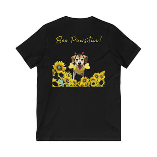 Bee Pawsitive Unisex V-neck Tee shirt in Black.  Shown is back of shirt showcasing a dog dressed as as bee in a a field of sunflowers with the phrase "Bee Pawsitive!" above it.  The front features the Bee Pawsitive Benefit Beagle Logo. 