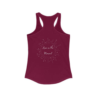 Live in the Moment Women's Ideal Racerback Tank in Cardinal Red. The Live in the Moment design features a graphic on the back with the phrase "Live in the Moment" surrounded by shooting stars.