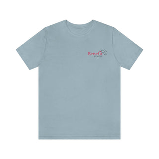 Different Pawspective Unisex Jersey Short Sleeve Tee in Light Blue. Shown is front of shirt with Benefit Beagle logo in the top corner . On the back is large colorful pawprint with the the phrase "Life is all about finding the beauty in a different pawspective" circled around it.