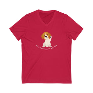 Easily Distracted Unisex Jersey Short Sleeve V-Neck Tee in Red. Shown is front design featuring a dog waving with the saying "Easily Distracted by Dogs" below it. The back of shirt has the classic Benefit Beagle Logo.