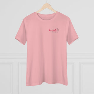 Different Pawspective Women's Premium Tee in Pink. Shown is front of shirt with Benefit Beagle logo in the top corner . On the back is large colorful pawprint with the the phrase "Life is all about finding the beauty in a different pawspective" circled around it.