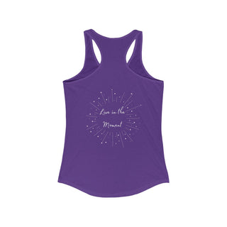 Live in the Moment Women's Ideal Racerback Tank in Purple Rush. The Live in the Moment design features a graphic on the back with the phrase "Live in the Moment" surrounded by shooting stars.