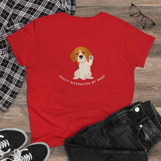 Easily Distracted Women's Midweight Cotton Tee in Red. Shown is front design featuring a dog waving with the saying "Easily Distracted by Dogs" below it. The back of shirt has the classic Benefit Beagle Logo.