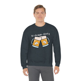 Beagle-Thirty Mugs Unisex Heavy Blend Crewneck Sweatshirt in Dark Heather. The front of shirt showcases Two Dog Adorned Mugs clinking with the saying, "It's Beagle-Thirty" above it. Back of shirt features corresponding Benefit Beagle Logo.