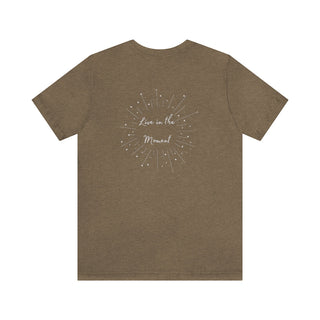 Live in the Moment Unisex Short Sleeve Tee in Heather Olive. The Live in the Moment design features a graphic on the back with the phrase "Live in the Moment" surrounded by shooting stars.