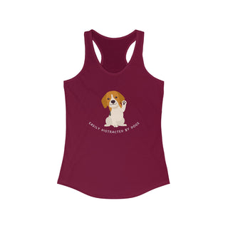 Easily Distracted Women's Racerback Tank in Cardinal Red. Shown is front design featuring a dog waving with the saying "Easily Distracted by Dogs" below it. The back of shirt has the classic Benefit Beagle Logo.