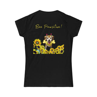 Bee Pawsitive Women's Softstyle Tee in Black. Shown is back of shirt showcasing a dog dressed as as bee in a a field of sunflowers with the phrase "Bee Pawsitive!" above it. The front features the Bee Pawsitive Benefit Beagle Logo.