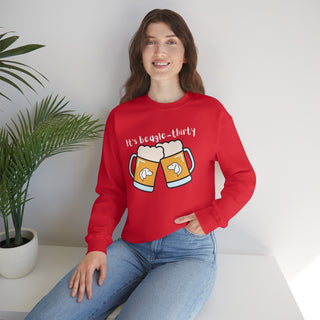 Beagle-Thirty Mugs Unisex Heavy Blend Crewneck Sweatshirt in Red. The front of shirt showcases Two Dog Adorned Mugs clinking with the saying, "It's Beagle-Thirty" above it. Back of shirt features corresponding Benefit Beagle Logo.