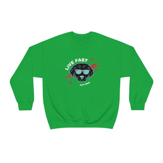 Play Hard Unisex Heavy Blend Crewneck Sweatshirt in Irish Green. The design features a cool dog with sunglasses and lightening bolts around it. The phrase "Live Fast, Play Hard" is around the design.