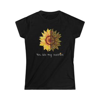 You are my Sunshine Women's Softstyle Tee in Black. Shown is the front showcasing a sunflower which is split down the middle and half is made out of paw prints. Underneath is the phrase "You are my Sunshine" . Back of shirt features the Sunflower Benefit Beagle Logo.