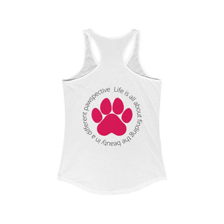 Different Pawspective Women's Racerback Tank in White. Shown is the back of shirt featuring a large colorful pawprint with the the phrase "Life is all about finding the beauty in a different pawspective" circled around it. The Benefit Beagle Logo is located in the top corner on the front of shirt.