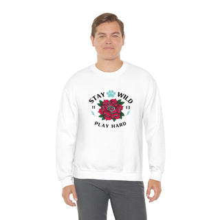 Stay Wild Unisex Heavy Blend Crewneck Sweatshirt in White. The Stay Wild Design features a tattoo style rose with the phrase "Stay Wild, Play Hard" around it. The back of shirt features the Stay Wild Benefit Beagle Logo Design.