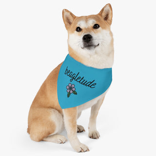 Dog wearing the Signature Tattoo Flower Dog Collar Bandana in Blue. The Signature Tattoo Flower design features the word "beagletude" with a tattoo style flower under it. Comes with adjustable black collar.